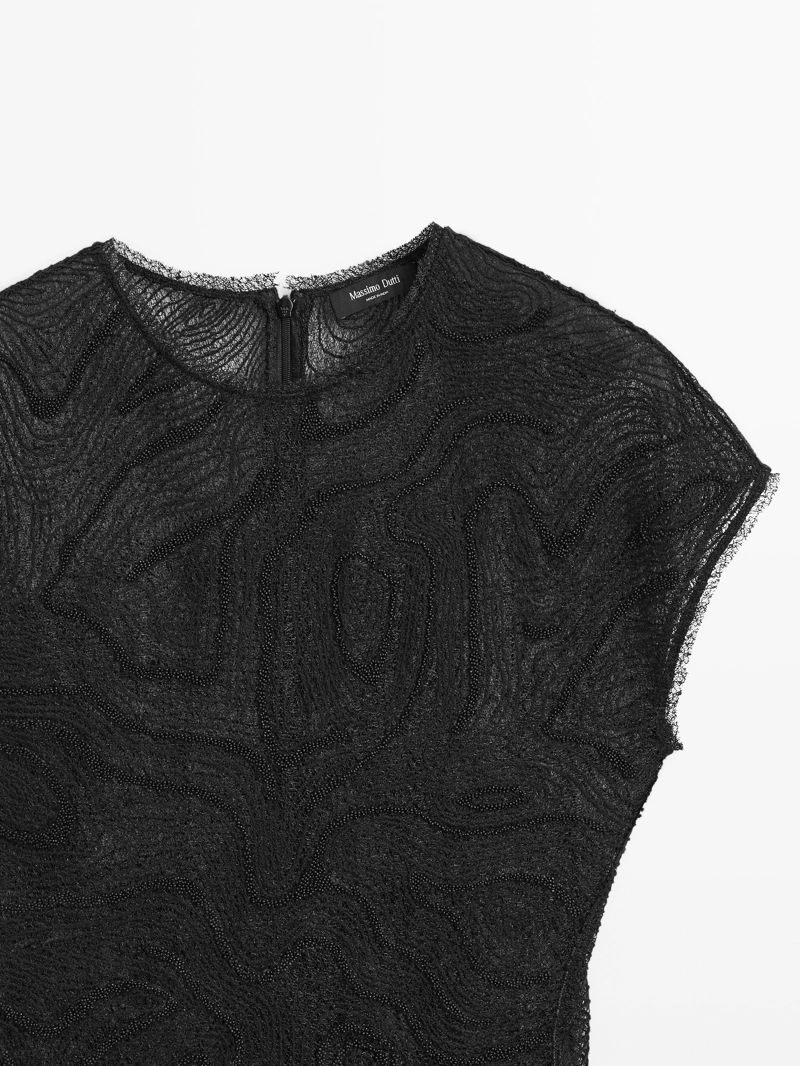 Топ с вышивкой из полупрозрачной ткани