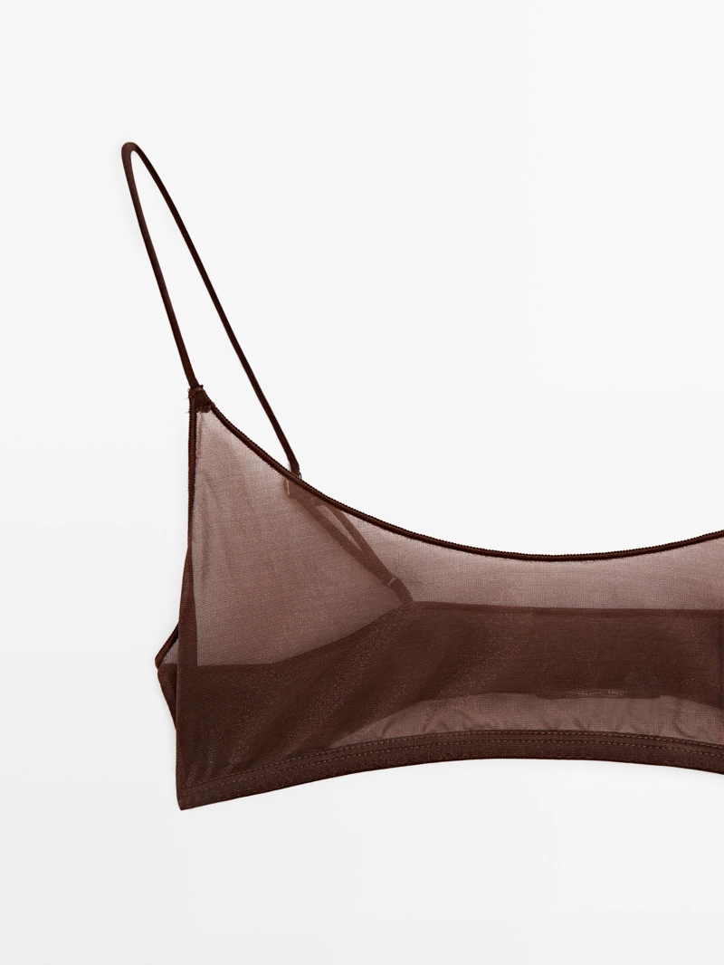 Топ из полупрозрачной ткани с металлическим декором