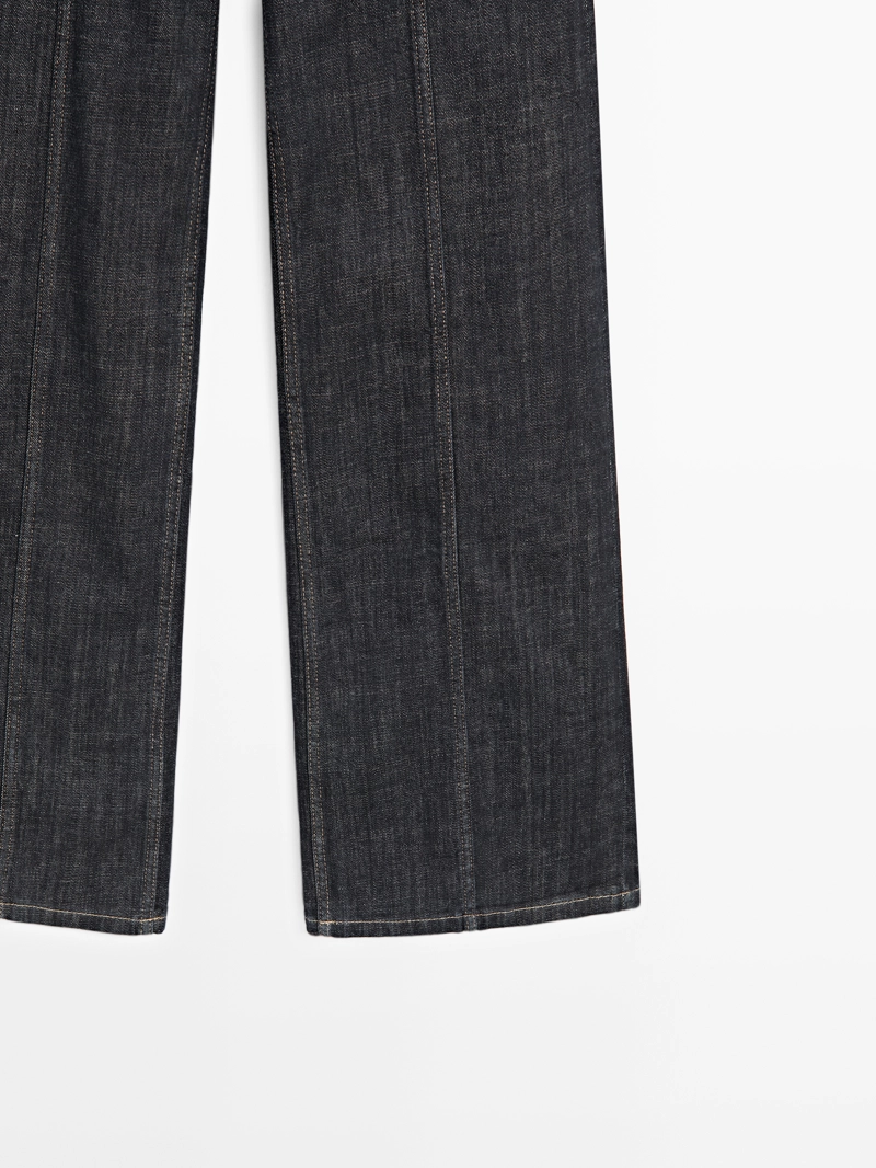 Джинсы с высокой талией и широкими штанинами с цепями