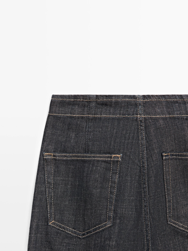 Джинсы с высокой талией и широкими штанинами с цепями