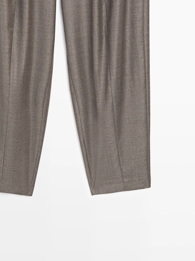 Брюки свободного кроя с зауженным силуэтом - limited