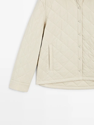 Короткая стеганая куртка с рубашечным воротником- Заказать в России