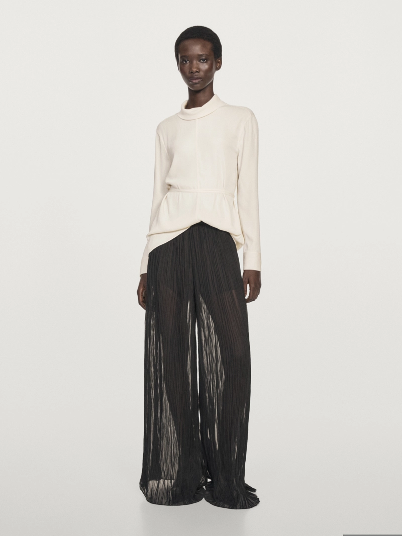 Широкие брюки с защипами