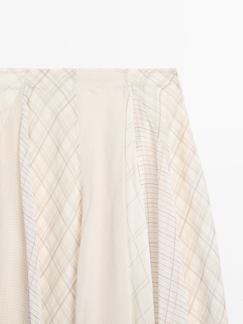 Асимметричная юбка-миди в клетку