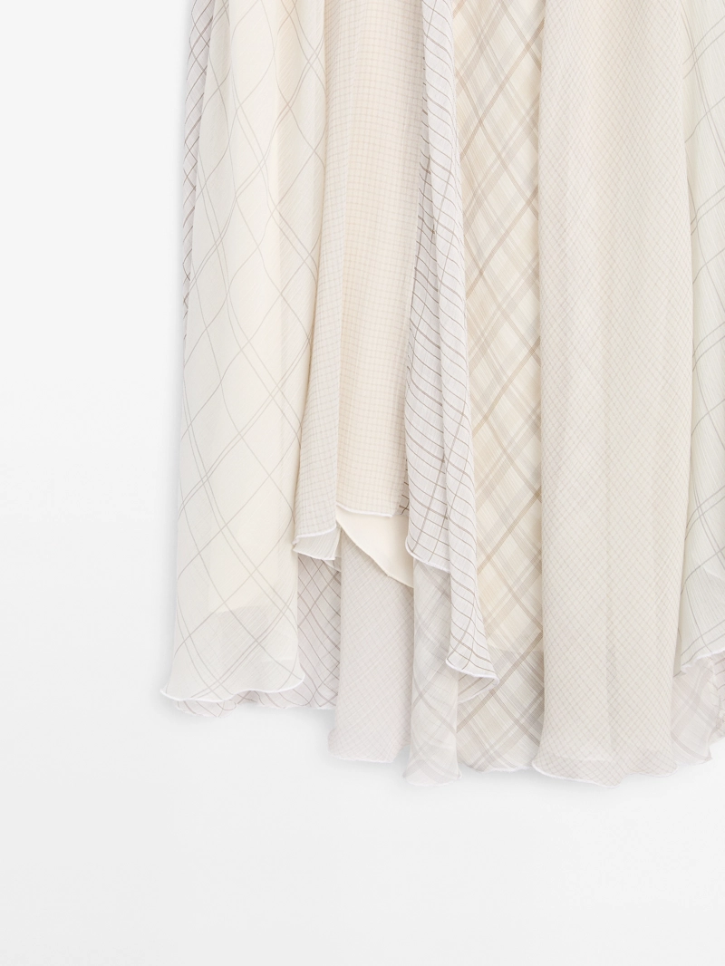 Асимметричная юбка-миди в клетку