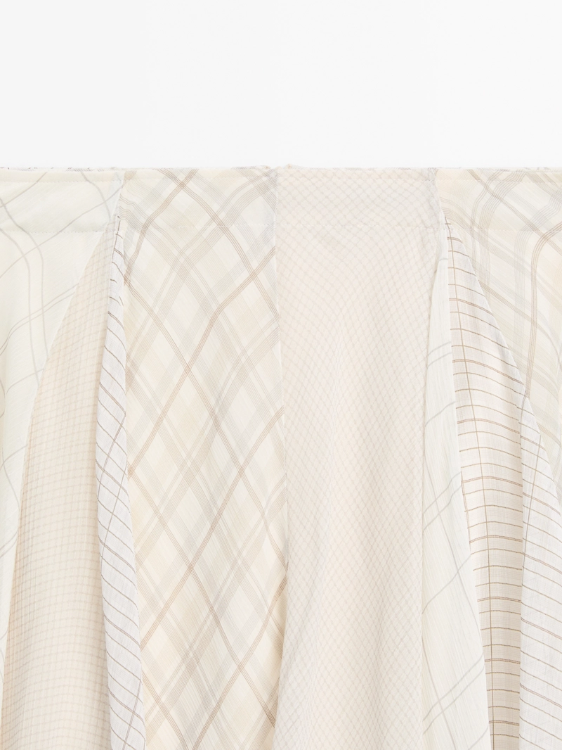 Асимметричная юбка-миди в клетку