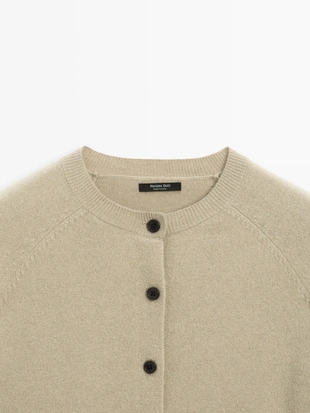 Короткий вязаный кардиган с реглановыми рукавами- Заказать в России