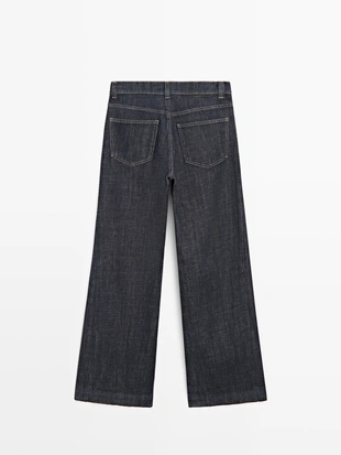 Джинсы с высокой посадкой и расклешенными брючинами- Заказать в России