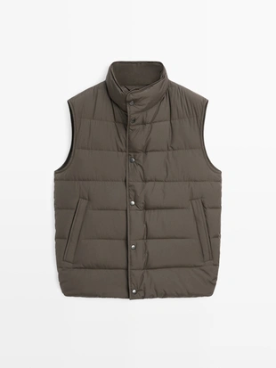 Пуховой жилет с водоотталкивающим покрытием и смесью пуха- Заказать в России