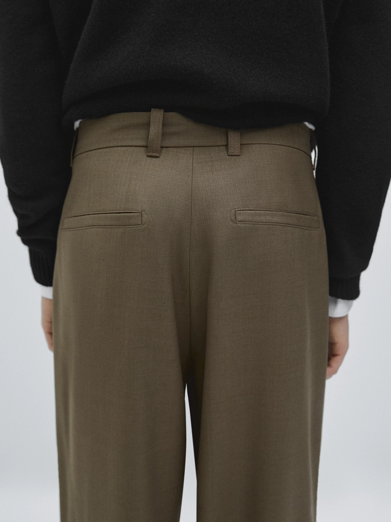 Брюки свободного кроя из шерстяной смеси с защипами