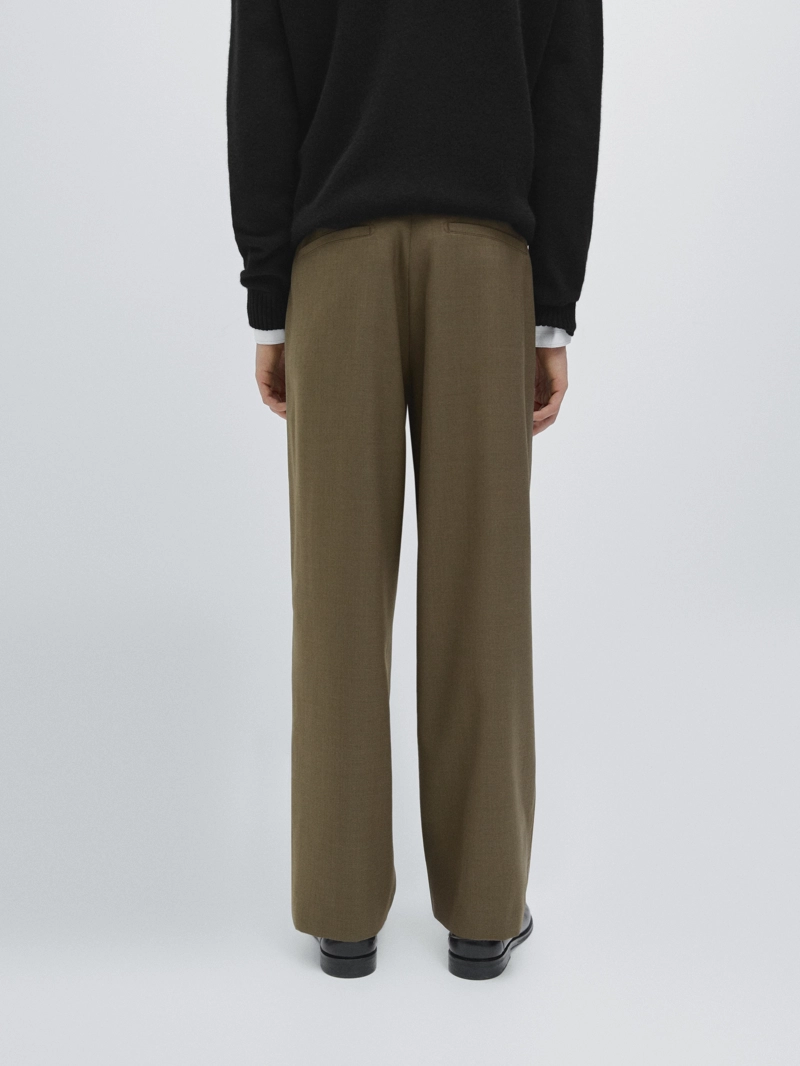 Брюки свободного кроя из шерстяной смеси с защипами