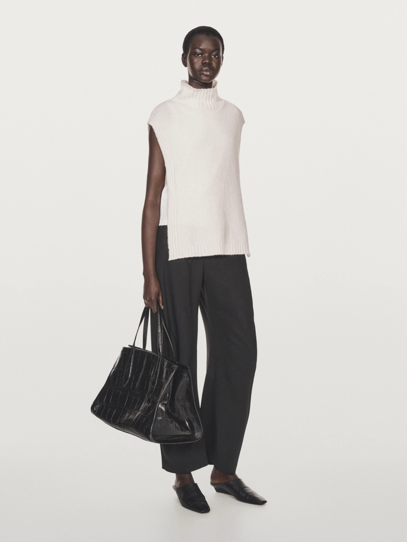 Жилетка с высоким воротником без рукавов