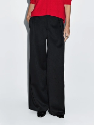 Широкие брюки с рельефными складками- Заказать в России