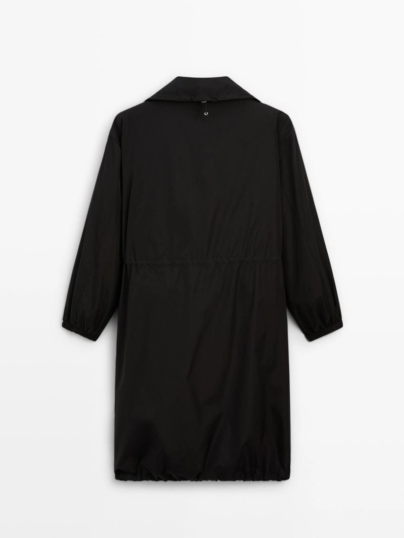 Парка с отстегивающимся внутренним жилетом, обладающая водоотталкивающими свойствами