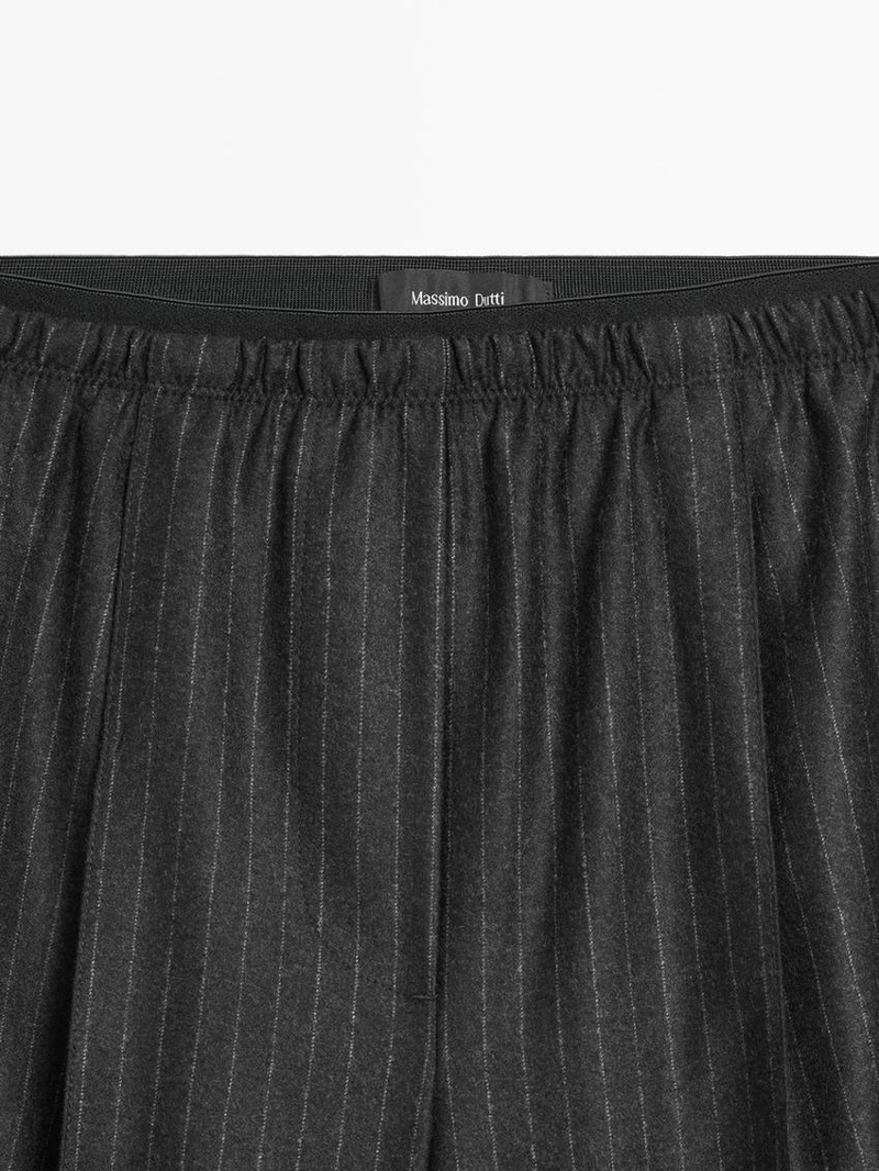 Брюки с рельефными полосками darted