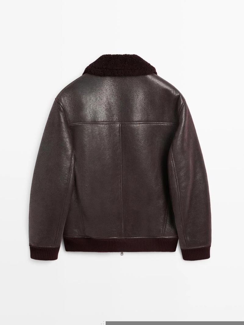 Короткая куртка из кожи двойного фасона с мехом