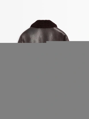 Короткая куртка из кожи двойного фасона с мехом- Заказать в России