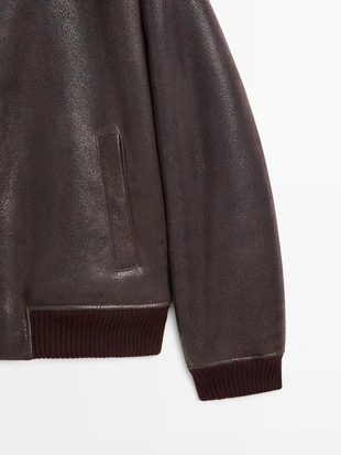 Короткая куртка из кожи двойного фасона с мехом- Заказать в России