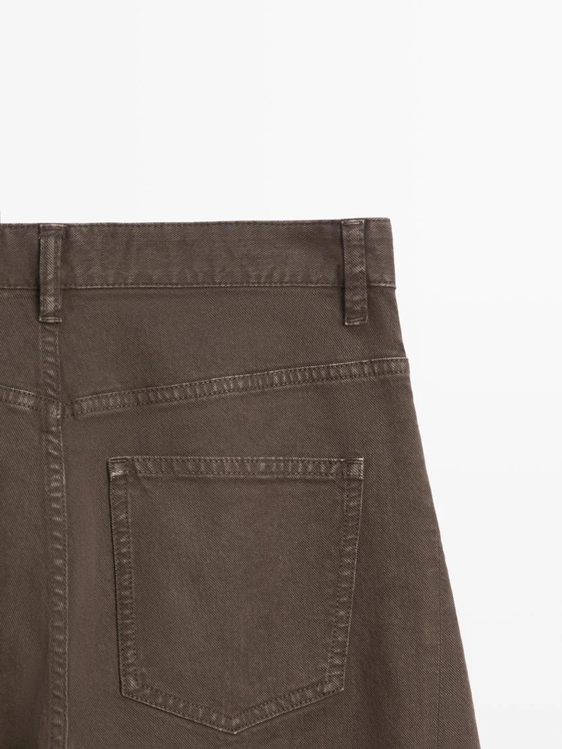 Джинсы с высокой талией и объемным кроем