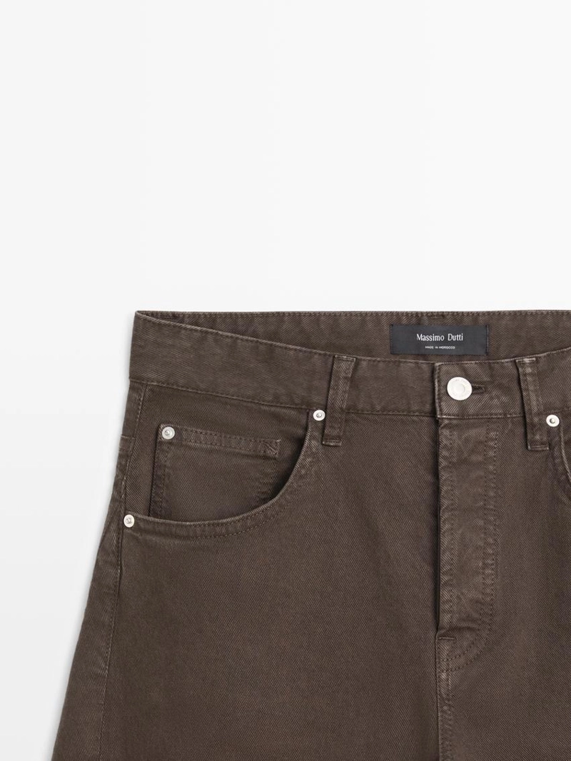 Джинсы с высокой талией и объемным кроем