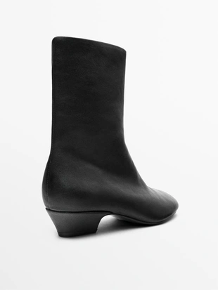 Кожаные ботильоны на каблуке- Заказать в России