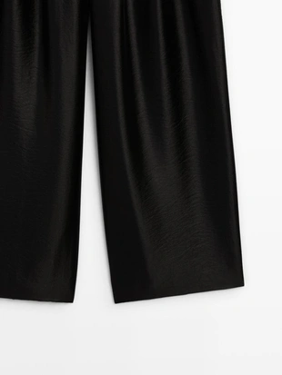 Широкие воздушные брюки с линиями- Заказать в России