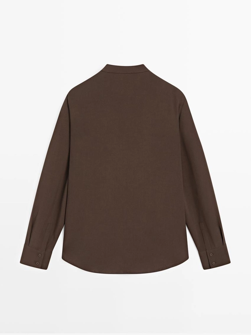 Блузка с оборками и разрезами