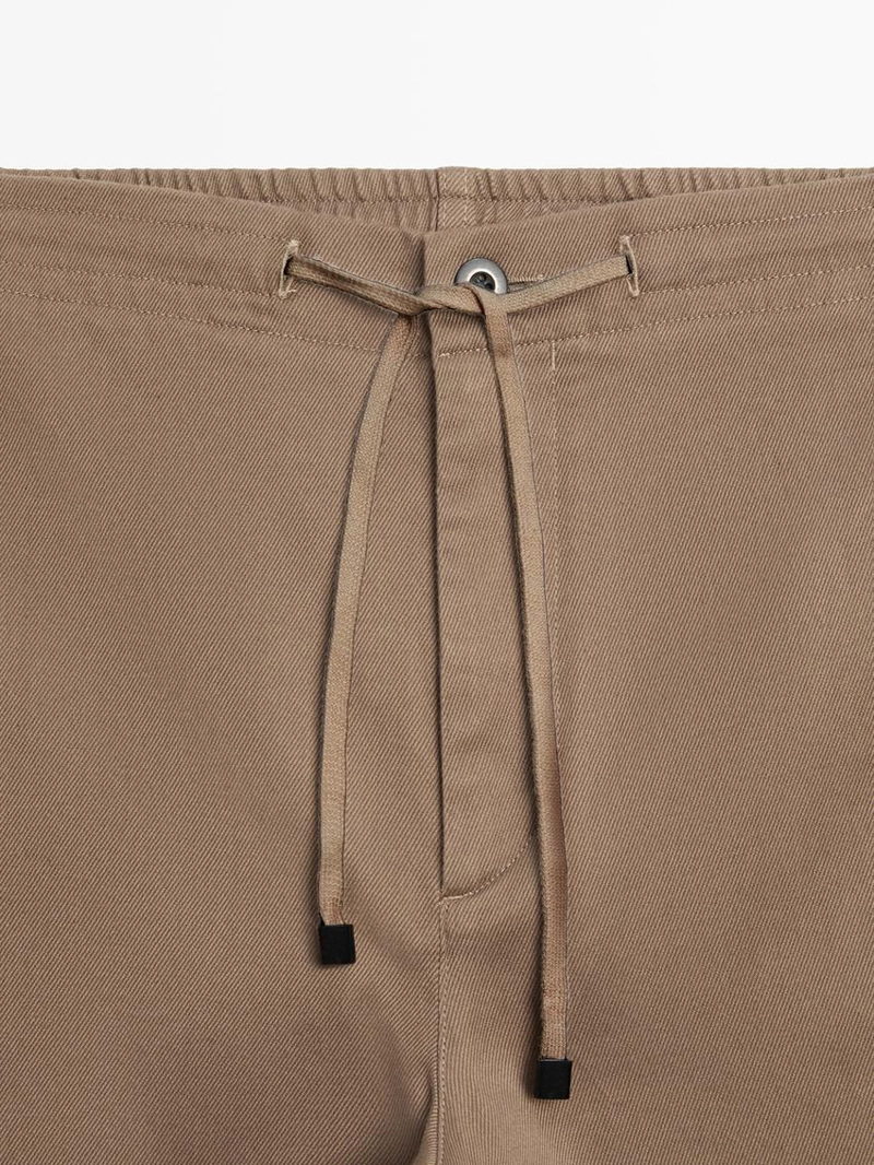 Хлопковые брюки в стиле джоггер из смесовой ткани