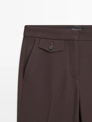 Брюки с карманами и расклешенным кроем- Заказать в России