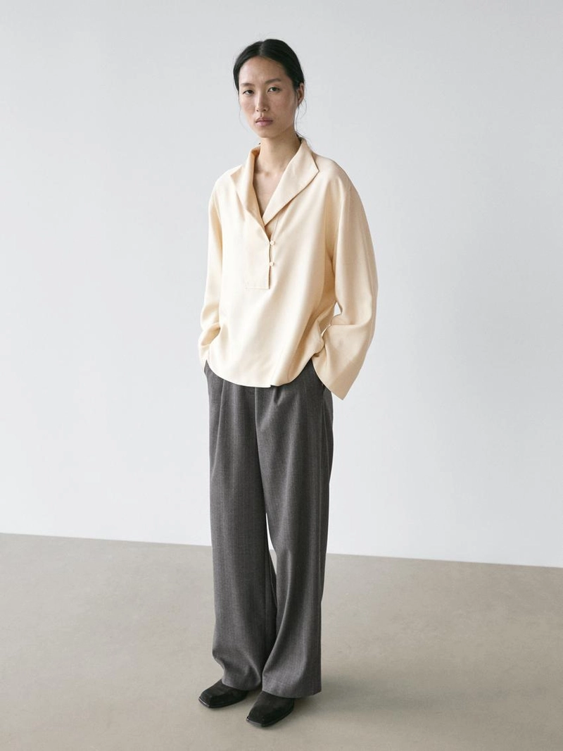 Блузка с биб-деталями