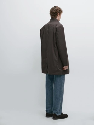 Полуприталенный пуховик с водоотталкивающей отделкой до середины бедра- Заказать в России