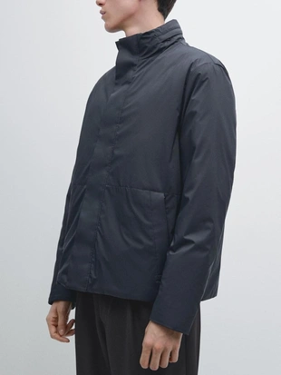 Короткая пуховая куртка с водоотталкивающей обработкой- Заказать в России