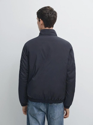 Ультралегкая пуховая куртка с водоотталкивающим покрытием- Заказать в России