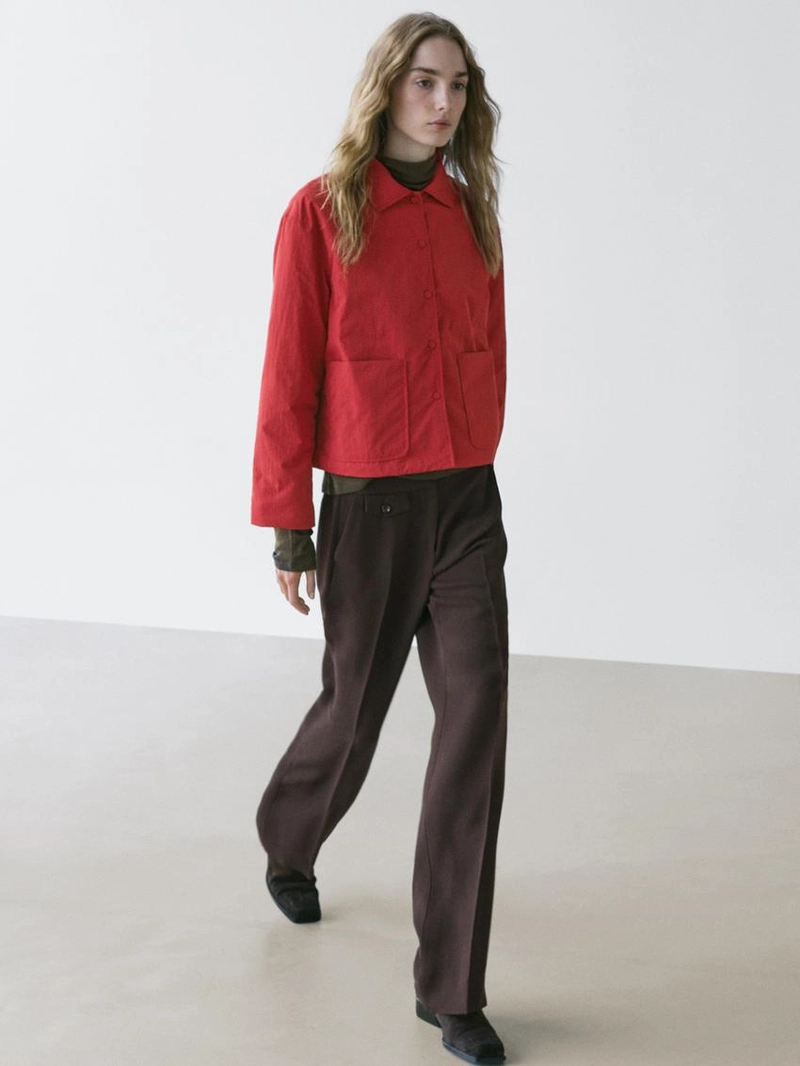 Короткий пуховик с карманом