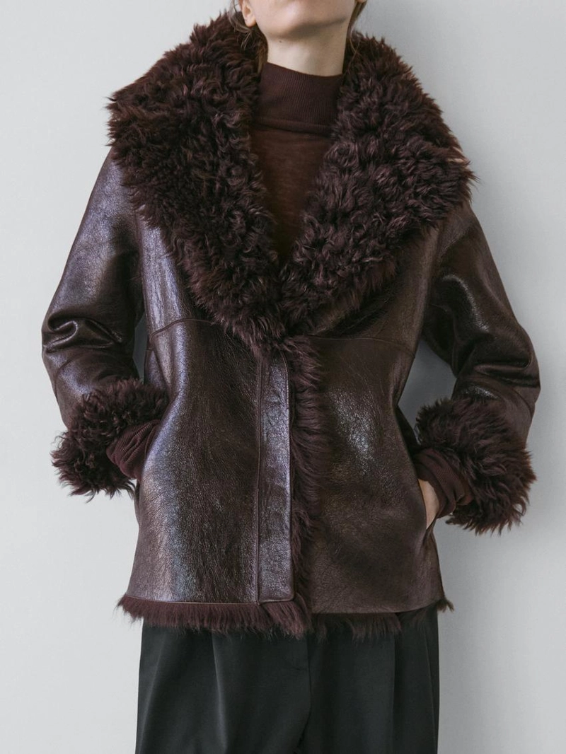 Кожаное пальто с меховым воротником - studio