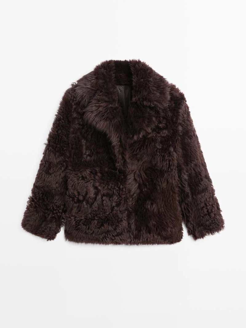 Кожаное пальто с меховым воротником - studio