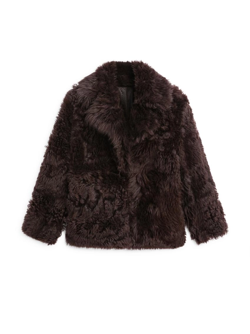 Кожаное пальто с меховым воротником - studio