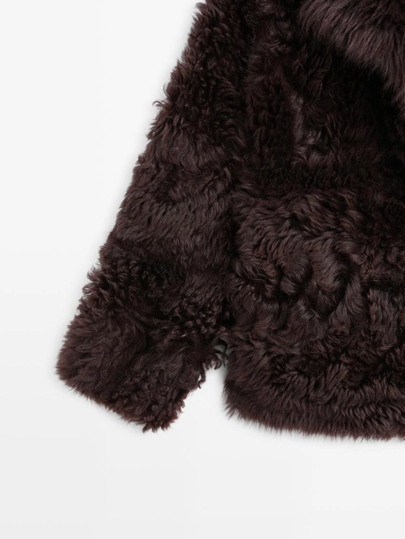 Кожаное пальто с меховым воротником - studio