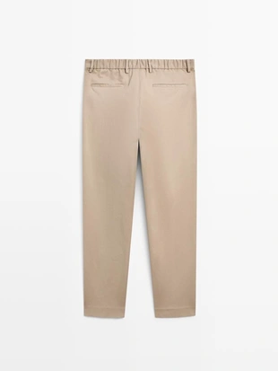 Брюки из смесового хлопка с линиями стрелок- Заказать в России