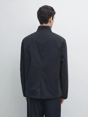 Пуховик с водоотталкивающей пропиткой- Заказать в России