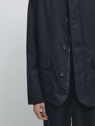 Пуховик с водоотталкивающей пропиткой- Заказать в России