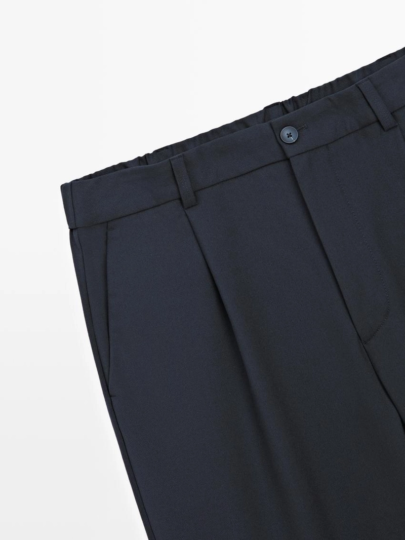 Брюки из шерстяной смеси свободного кроя с защипами