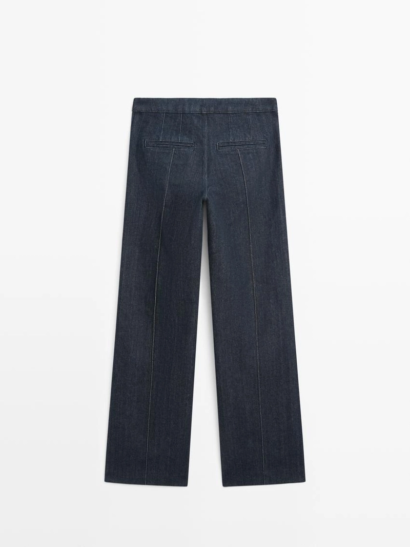 Джинсы с высокой посадкой и расклешенными брючинами с карманами