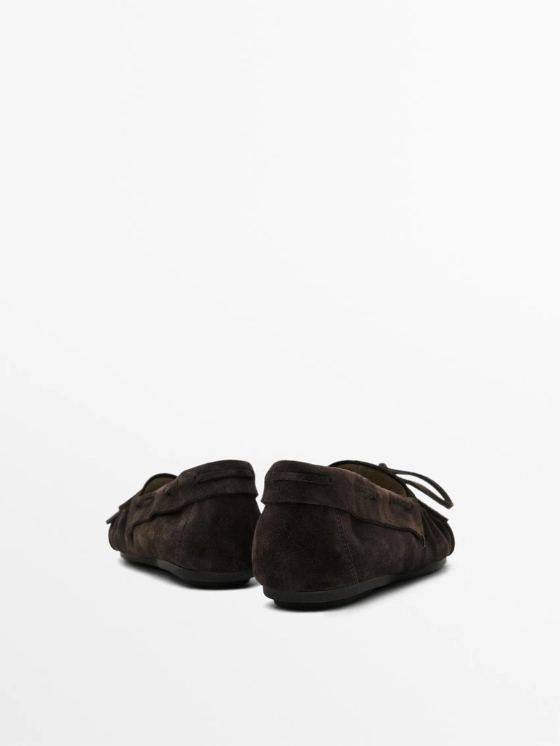 Туфли из разделанной кожи с объемным бантом