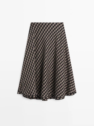 Юбка расклешенная с клетчатыми деталями- Заказать в России