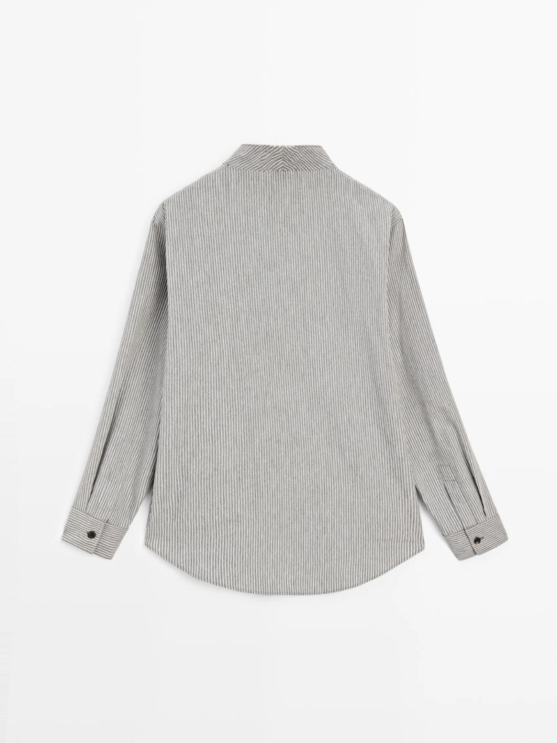 Рубашка в полоску со свободным покроем и деталями на пуговицах