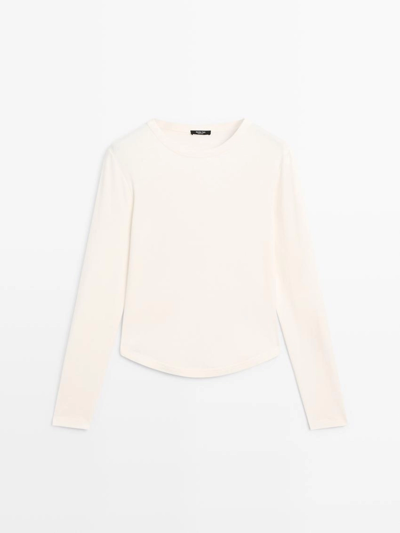 Футболка с длинным рукавом и закругленным подолом
