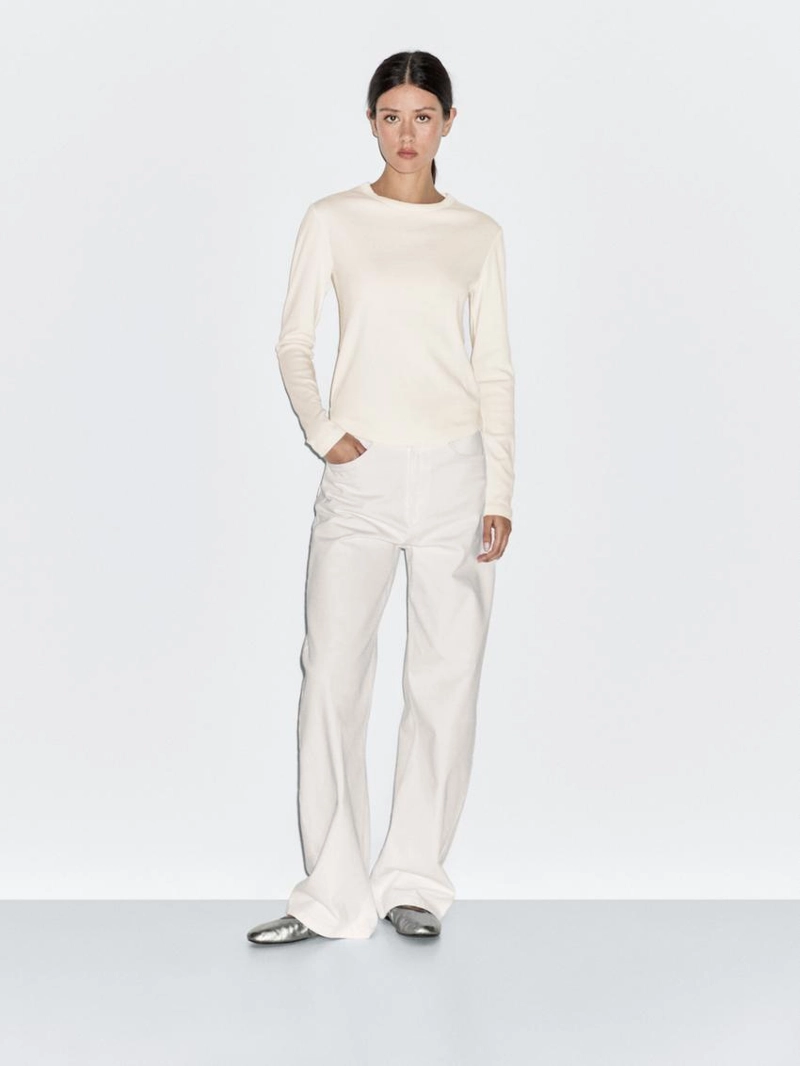 Футболка с длинным рукавом и закругленным подолом