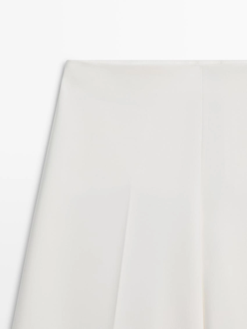 Широкие объемные брюки