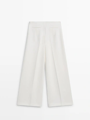 Широкие объемные брюки- Заказать в России